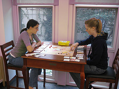 Patrons playing on game table
